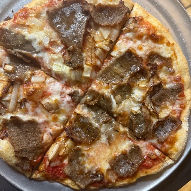 Gyro Pizza with Onion.