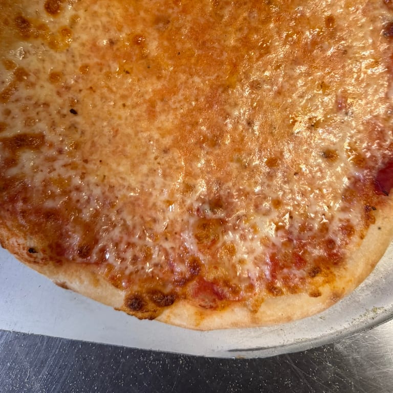 Indulge in Our Cheese Pizza